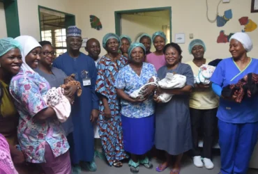 The CMD, National Hospital, Prof. Muhammad Mahmud, the parents of the sextuplets, Mr Ifeanyi and Mrs Precious Nwachukwu and hospital staff with the sextuplets, on Thursday in Abuja
